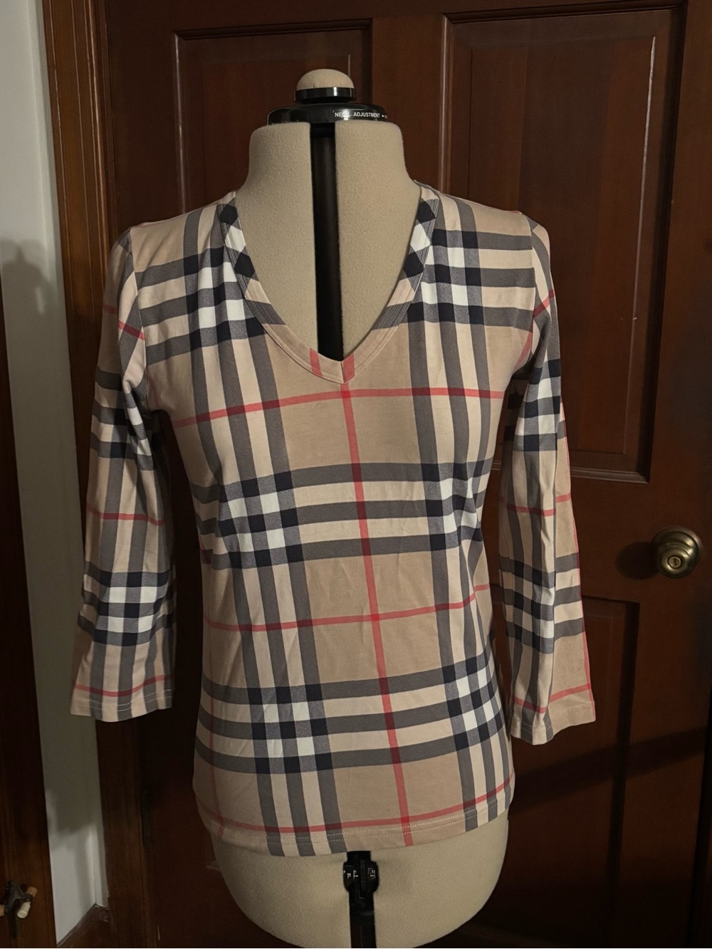 Burberry Beige Plaid V-Neck Long Sleeve Top with black & Red Accents